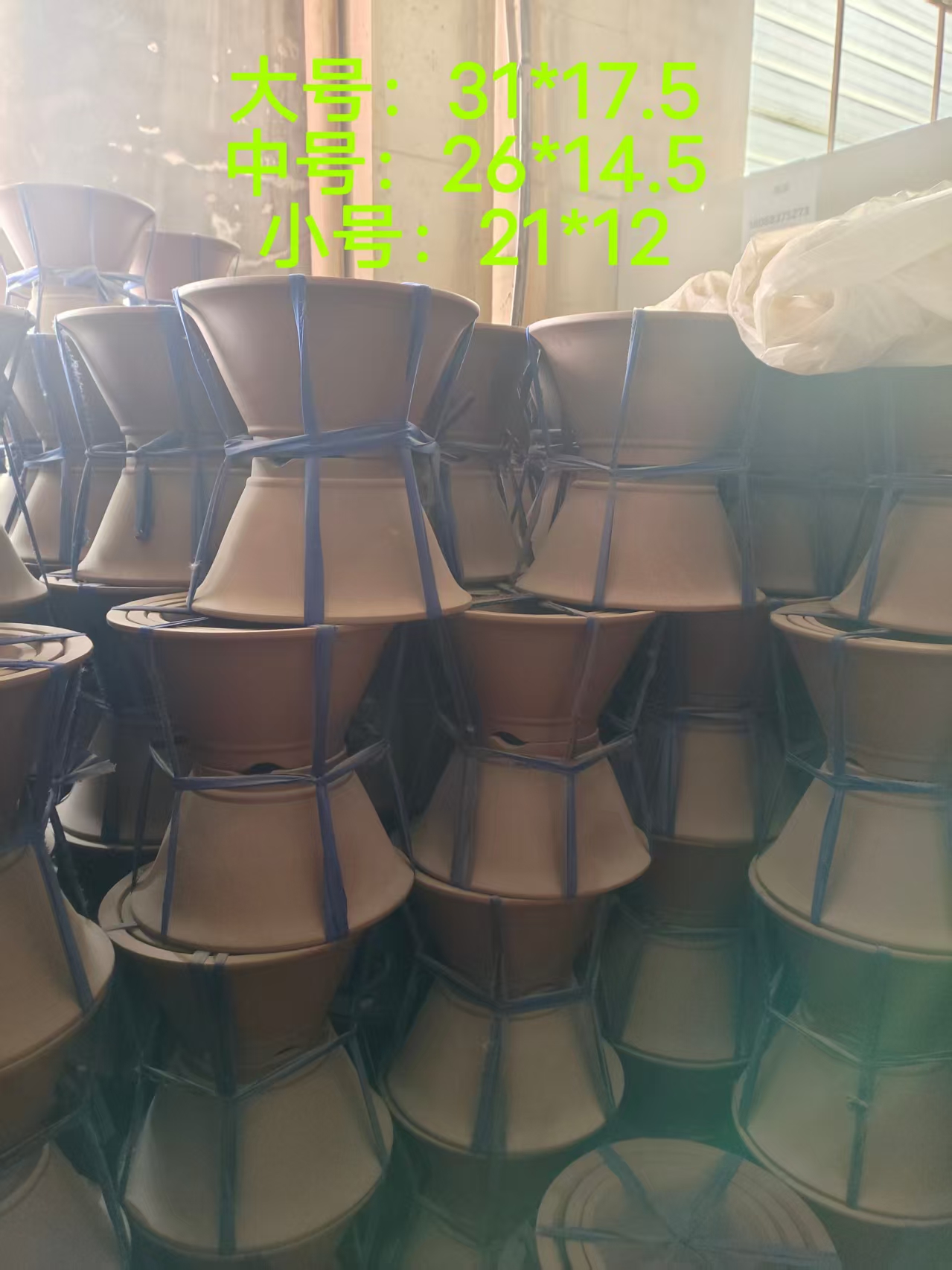 Set of nesting ceramic pots for growing your own kitchen herb garden indoors.jpg